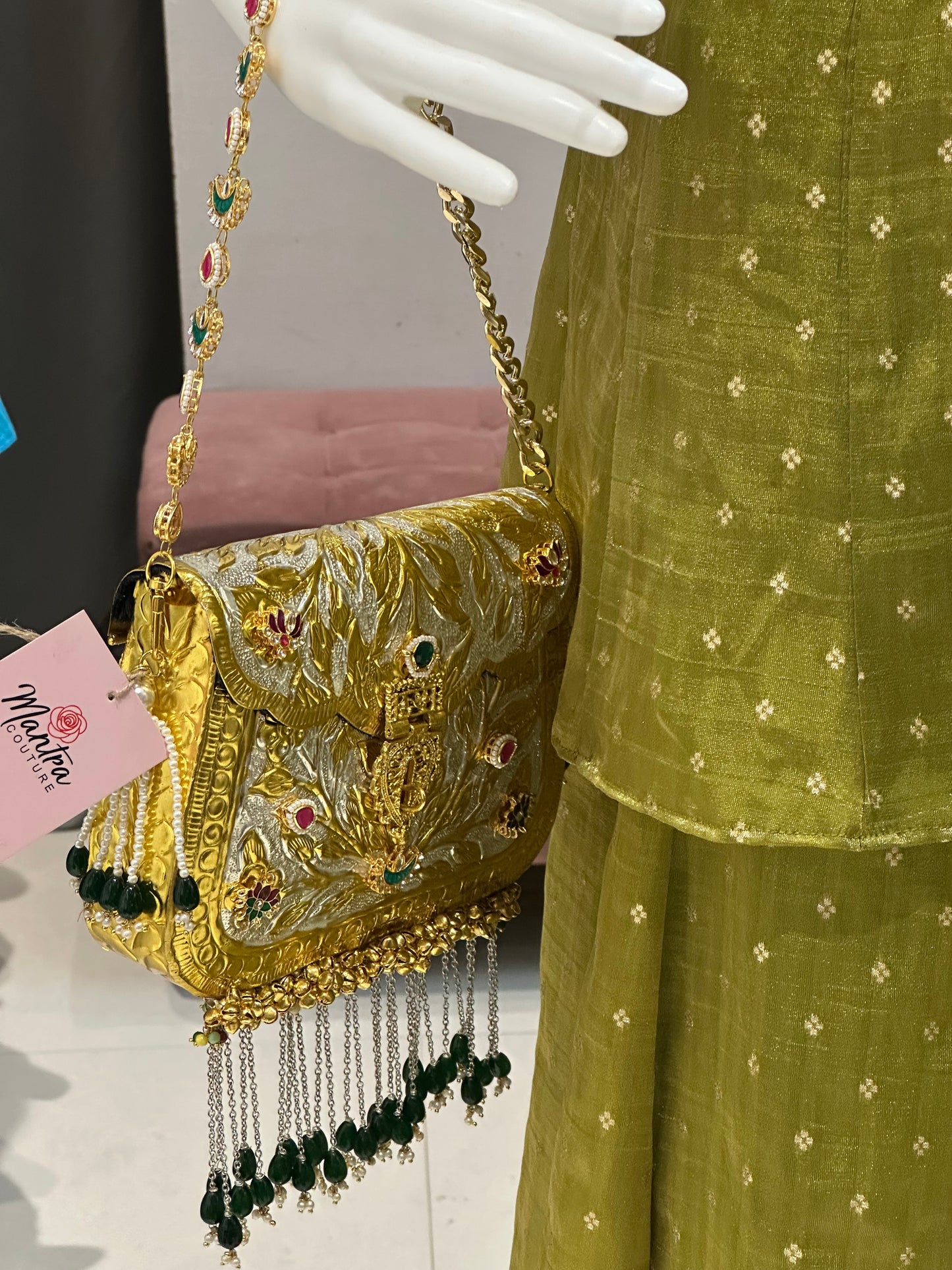 regal zari embroidered gold metal bag