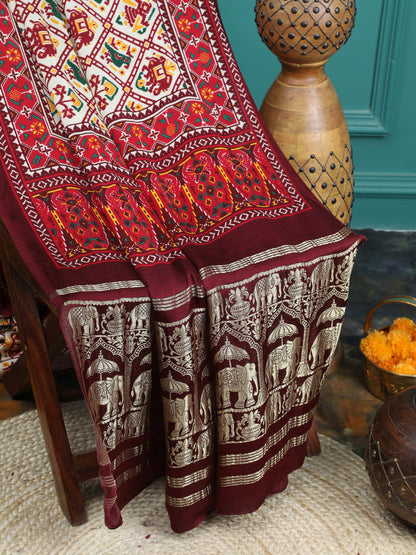 PATOLA IKKAT MAROON & OFFWHITE PRINT SAREE WITH HATHI BANARASI PALLU