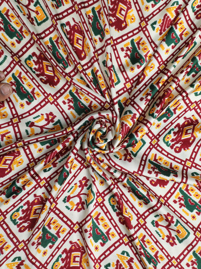 PATOLA IKKAT MAROON & OFFWHITE PRINT SAREE WITH HATHI BANARASI PALLU