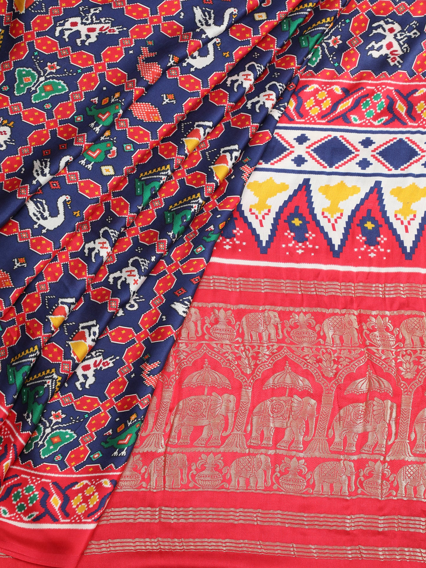 red & blue ikkat saree with tissue pallu