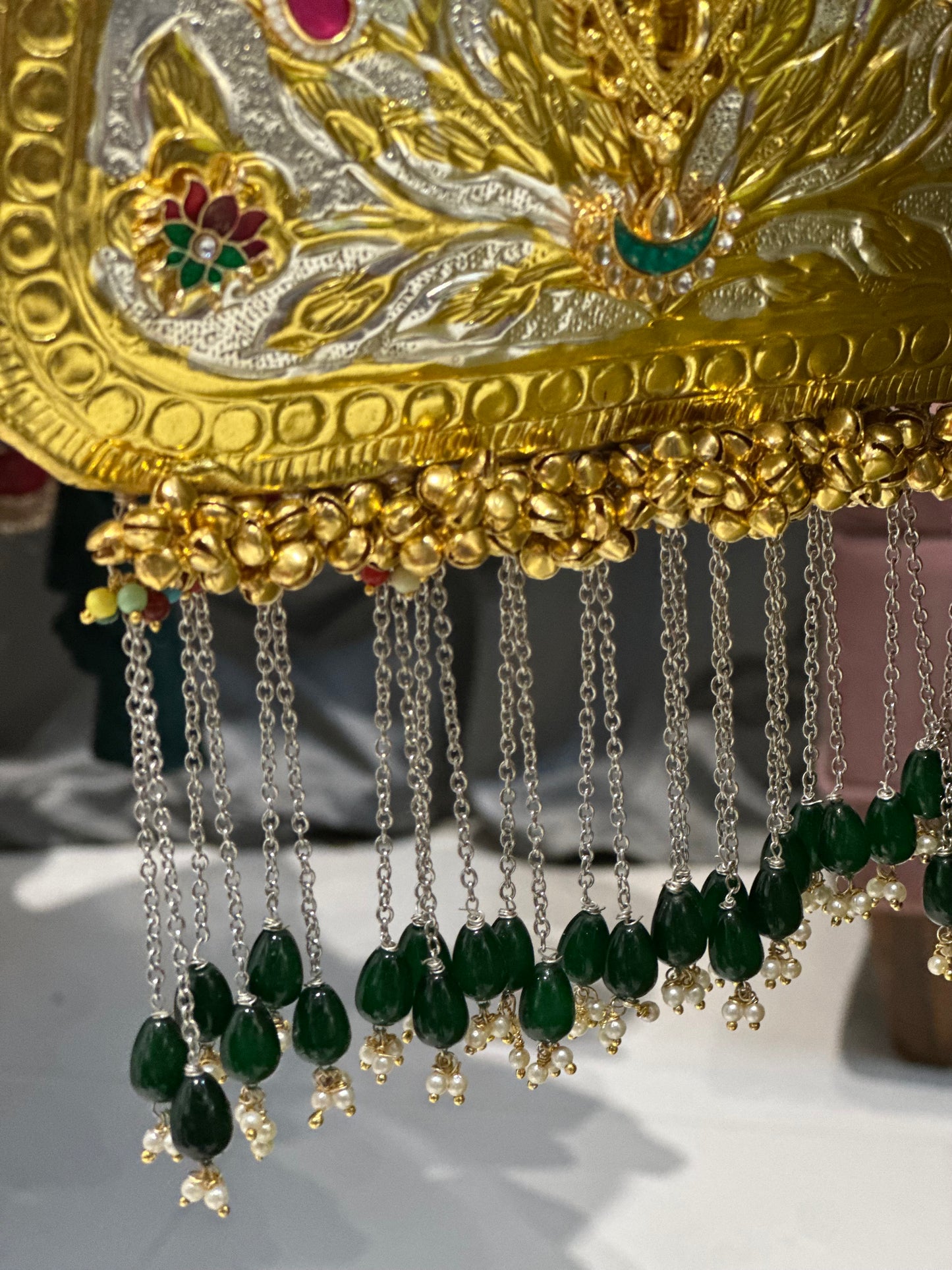 regal zari embroidered gold metal bag