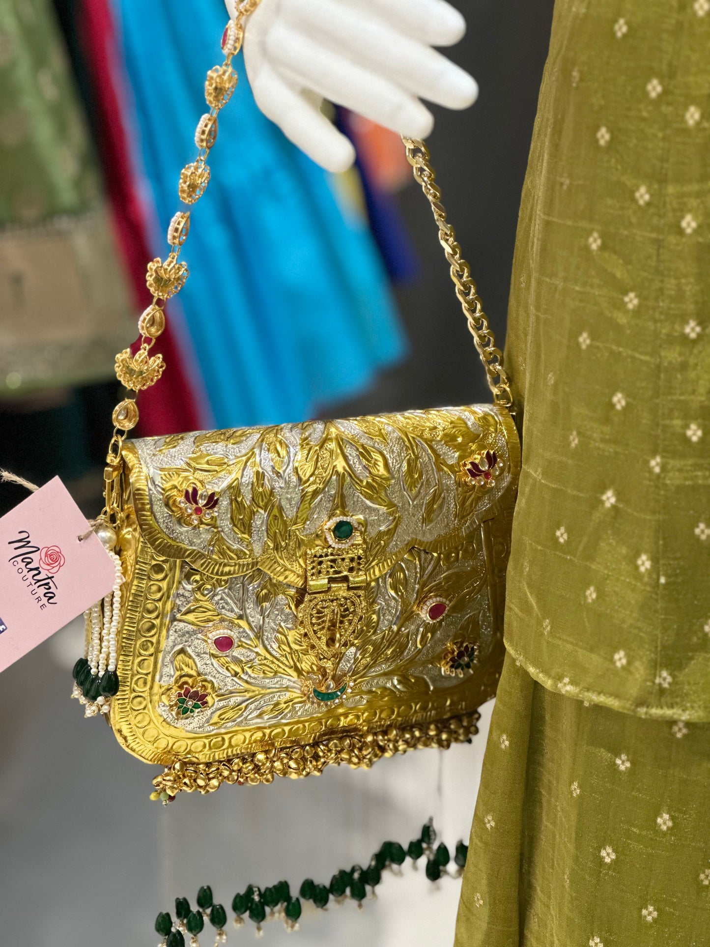 regal zari embroidered gold metal bag